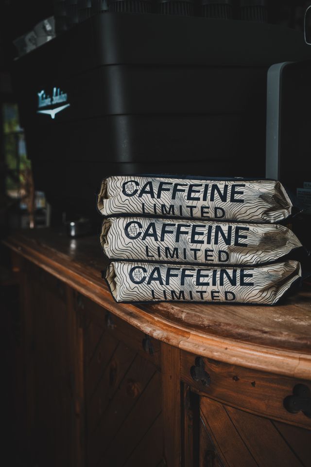 Victoria Arduino Espresso Machine and three bags of Caffeine Coffee Top Dog Blend Wholesale bags